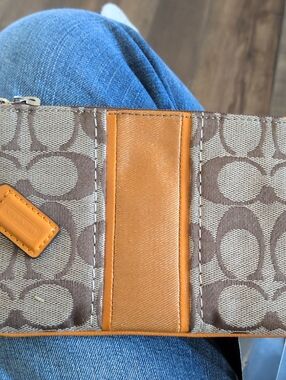 Coach Signature Canvas Wristlet  With Tan Signature C And Orange Accents